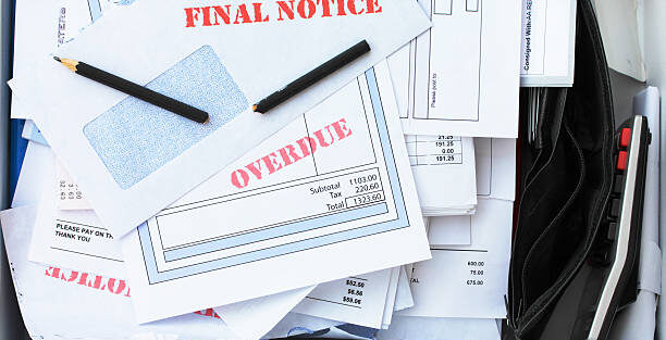 stack of overdue bills